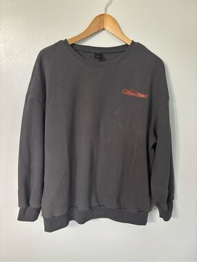 Gray Crewneck Sweatshirt with Orange 'Mountains' Script